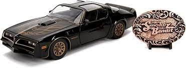 1:24 SMOKEY AND THE BANDIT 1977 PONTIAC FIREBIRD W/REPLICA BUCKLE